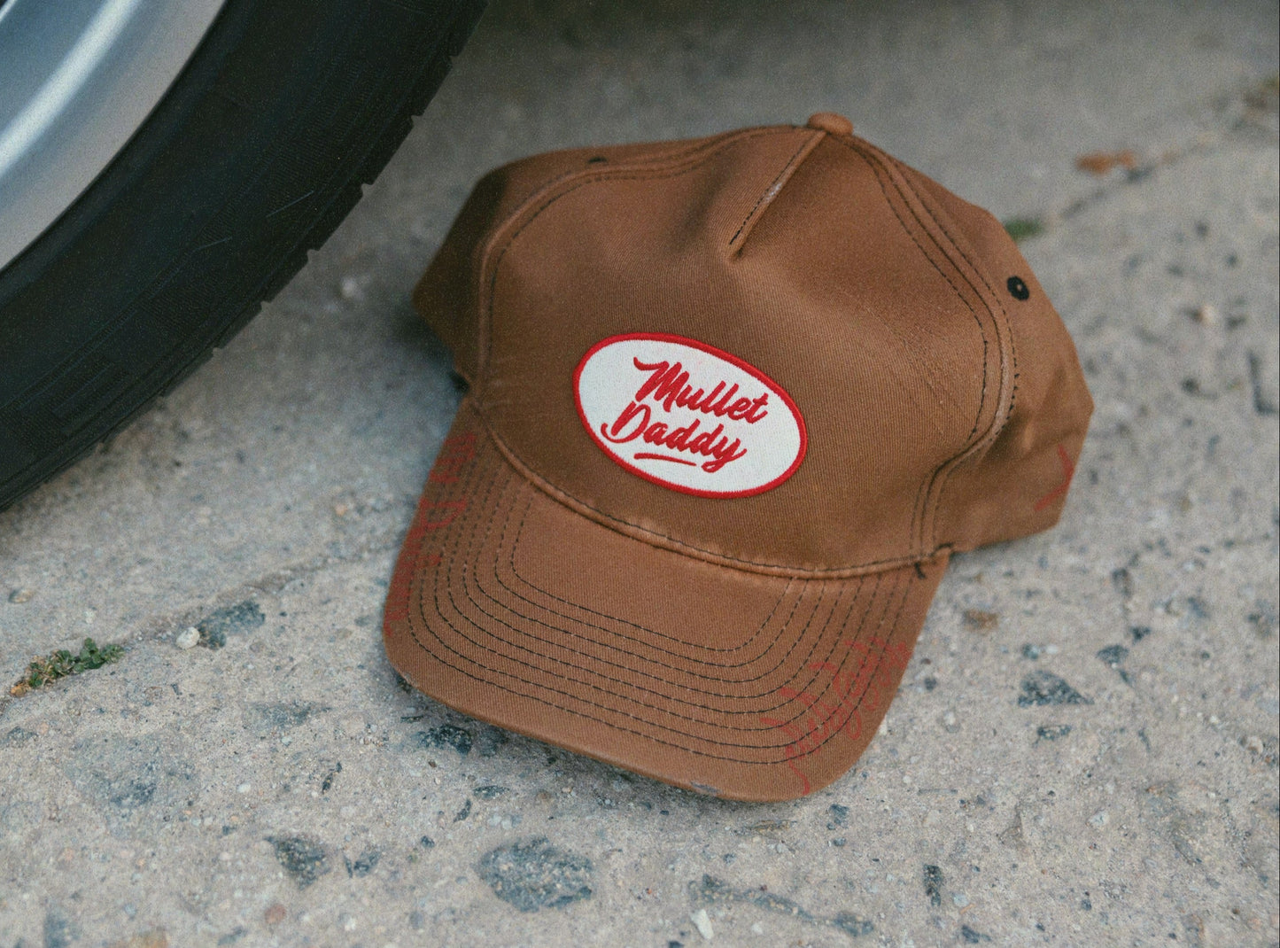 Mullet Daddy Cap by My Darlene — washed brown canvas unstructured cap with oval Mullet Daddy embroidered patch on front
