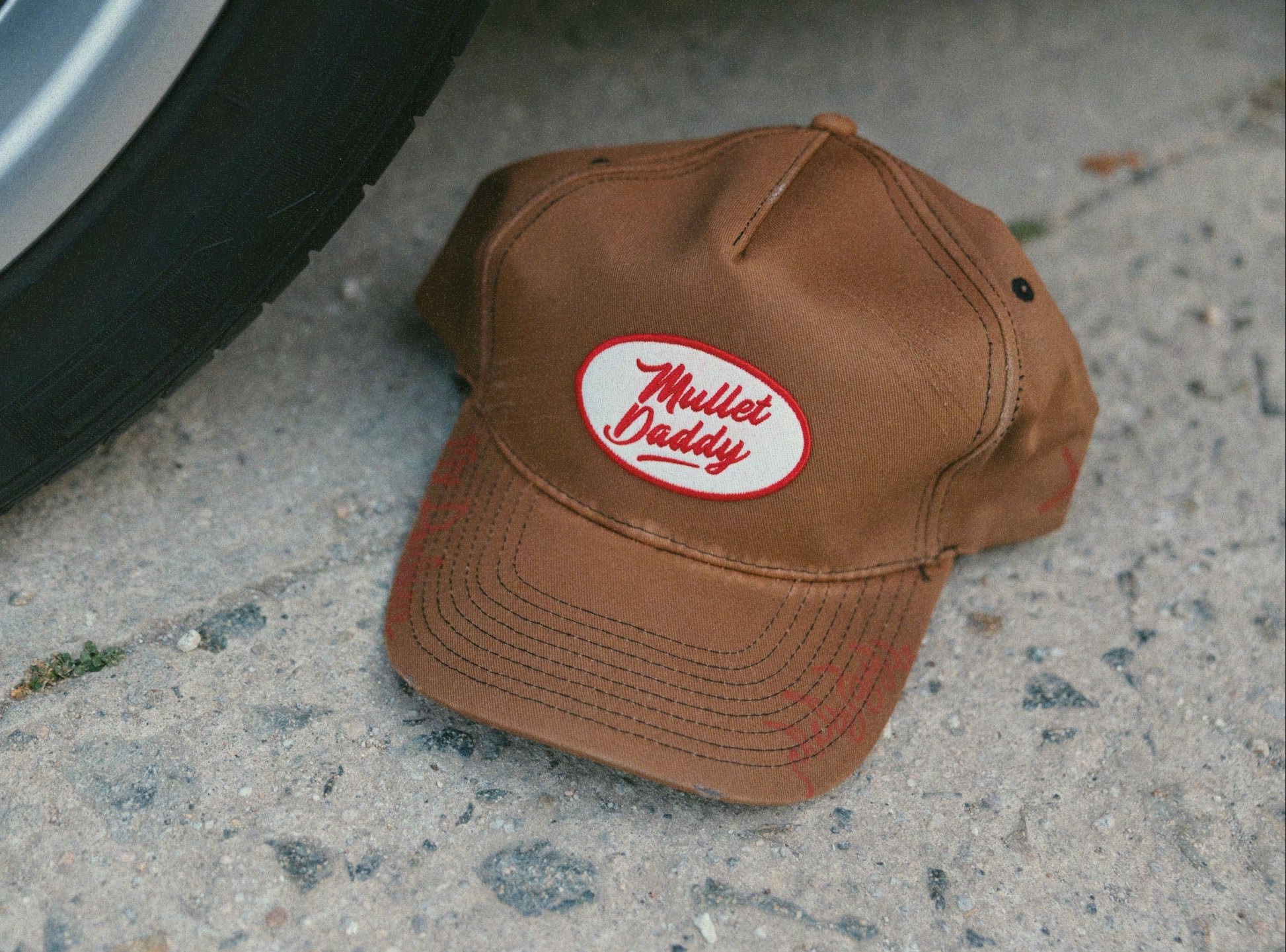 Mullet Daddy Cap by My Darlene — washed brown canvas unstructured cap with oval Mullet Daddy embroidered patch on front